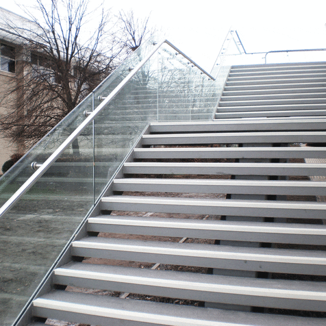 Steel stair external glass balustrade design