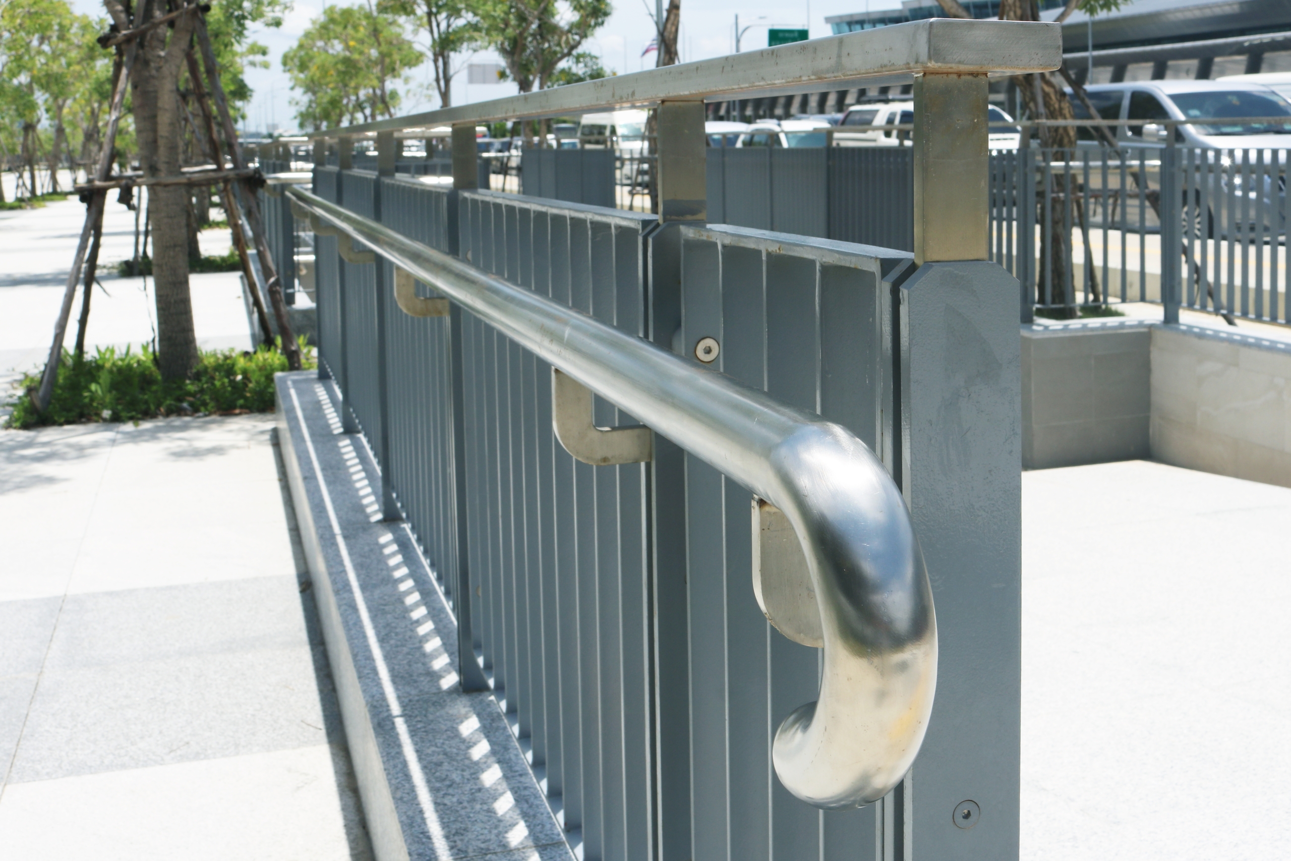 Stainless,Steel,Railing,Structure,Installed,On,Metal,Fence,In,The